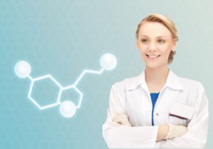 healthcare, medicine and technology concept - smiling female doctor with molecule of serotonin over blue background